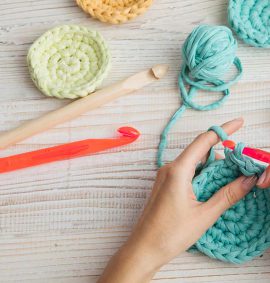 woman crocheting