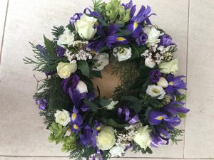 White and purple floral wreath