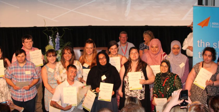 Group of adult learners at awards ceremony