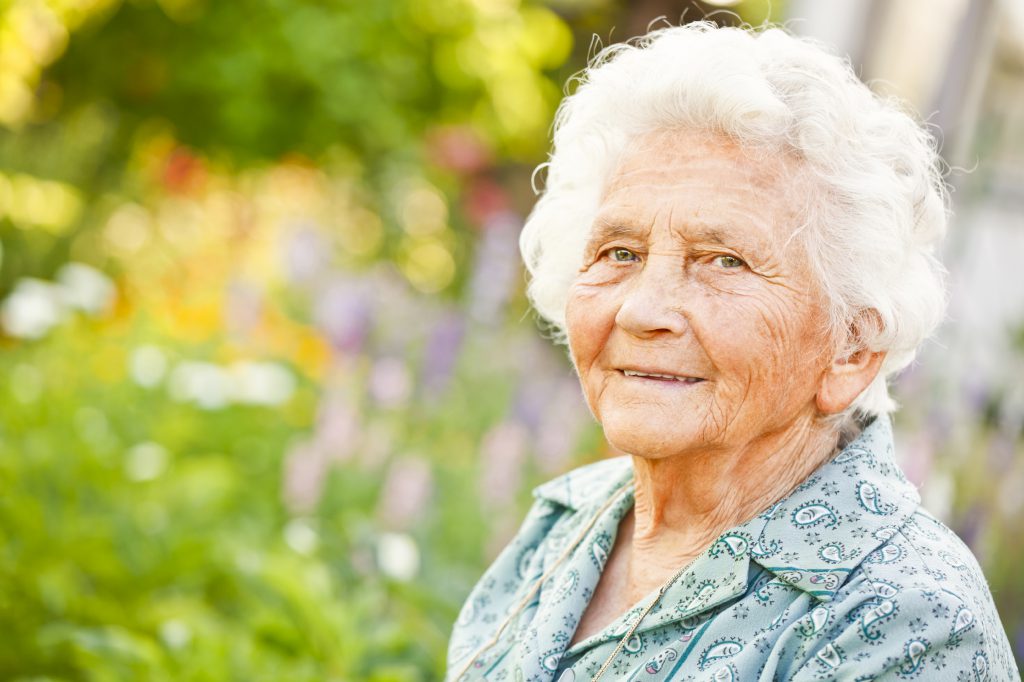 older lady in a garden