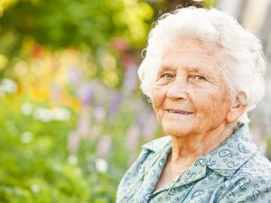 older lady in a garden