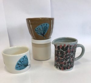 Hand painted ceramic pots and jug
