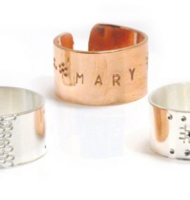 One copper ring and two silver rings