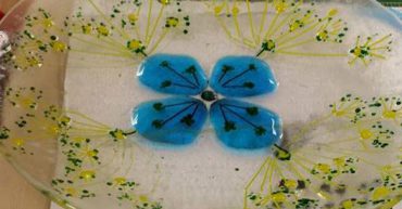 Fused glass plate