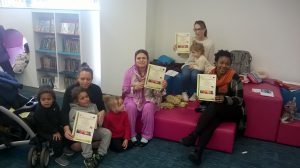 A group of women and children at Aylesbury library