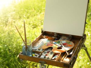 an artists easel and paints