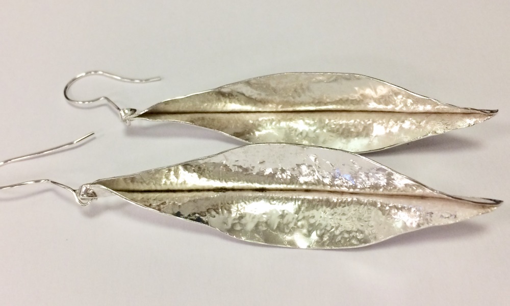 Two silver leaf earrings